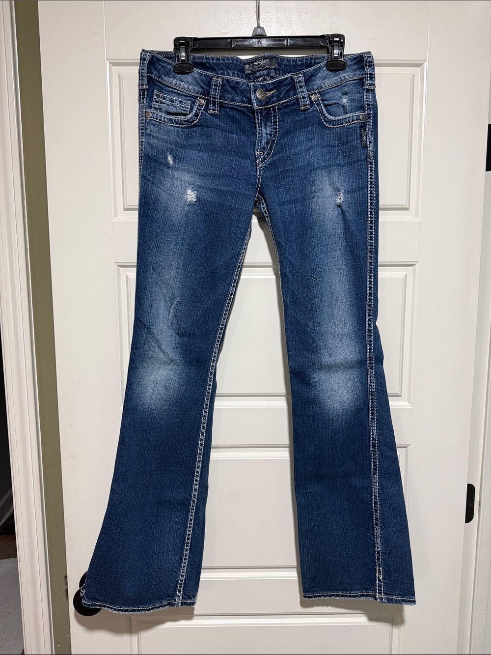 Silver Jeans Medium Blue Flare Jeans with Subtle Distressing 30x33